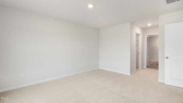 100 Grove Ln, Goldsboro, NC 27534 - empty room featuring light colored carpet and recessed lighting