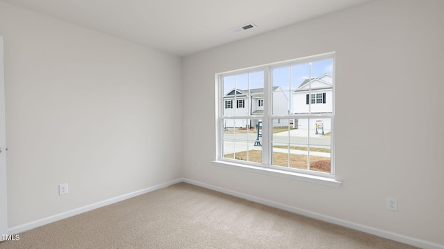 100 Grove Ln, Goldsboro, NC 27534 - carpeted spare room with baseboards
