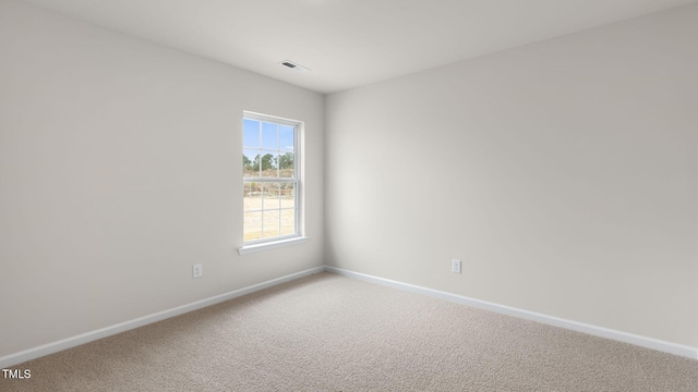 100 Grove Ln, Goldsboro, NC 27534 - carpeted spare room featuring baseboards