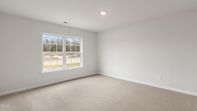 100 Grove Ln, Goldsboro, NC 27534 - carpeted empty room with baseboards and recessed lighting