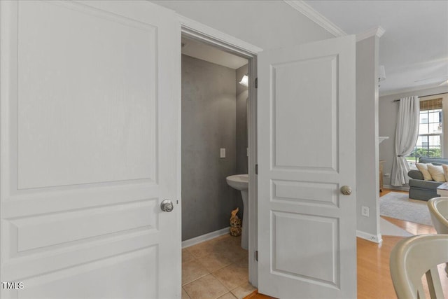 7856 Spungold St, Raleigh, NC 27617 - bathroom featuring baseboards and crown molding
