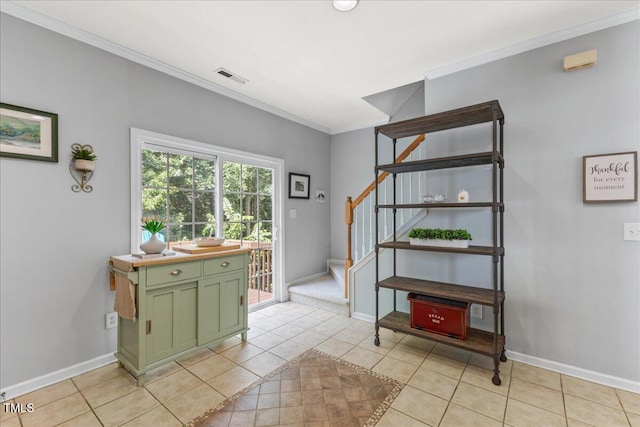 7856 Spungold St, Raleigh, NC 27617 - interior space featuring ornamental molding, light tile patterned floors, and stairway