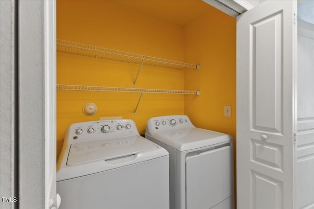 7856 Spungold St, Raleigh, NC 27617 - laundry room featuring separate washer and dryer