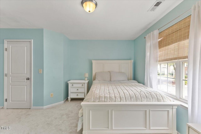 7856 Spungold St, Raleigh, NC 27617 - bedroom featuring light carpet and baseboards