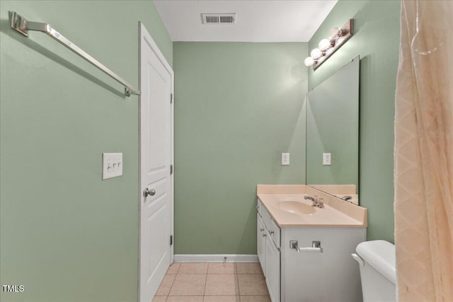 7856 Spungold St, Raleigh, NC 27617 - bathroom featuring vanity and tile patterned floors