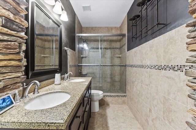 7856 Spungold St, Raleigh, NC 27617 - bathroom featuring a stall shower and double vanity