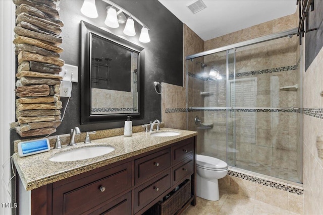 7856 Spungold St, Raleigh, NC 27617 - bathroom with a stall shower, double vanity, and tile patterned floors