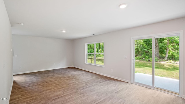 105 Grove Ln, Goldsboro, NC 27534 - unfurnished room featuring wood finished floors, a smoke detector, and recessed lighting