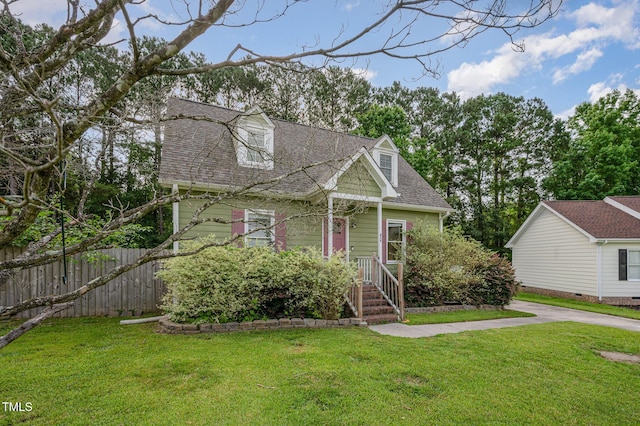 816 Kimpton Ct, Fuquay Varina, NC 27526 - cape cod house featuring a shingled roof