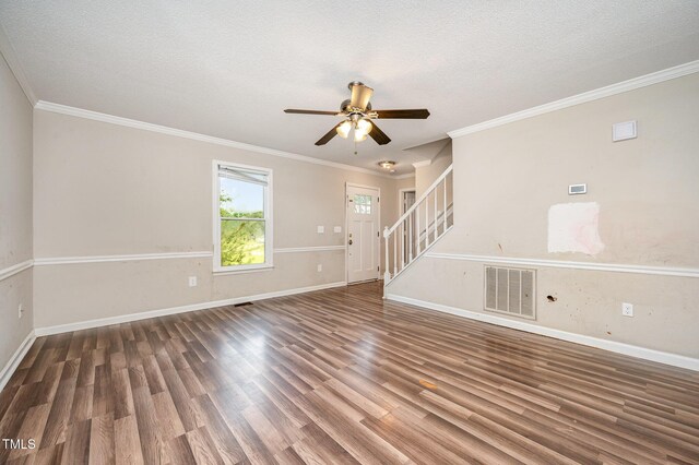 816 Kimpton Ct, Fuquay Varina, NC 27526 - unfurnished living room featuring stairway, wood finished floors, a ceiling fan, ornamental molding, and a textured ceiling