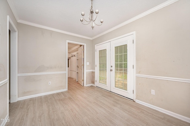 816 Kimpton Ct, Fuquay Varina, NC 27526 - empty room with french doors, a chandelier, wood finished floors, and crown molding