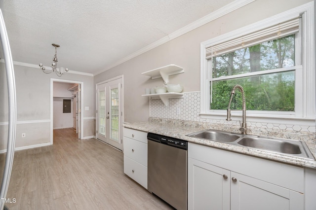 816 Kimpton Ct, Fuquay Varina, NC 27526 - kitchen with dishwasher, backsplash, light wood-style floors, light countertops, and white cabinetry