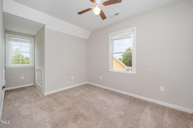 816 Kimpton Ct, Fuquay Varina, NC 27526 - spare room with light colored carpet, lofted ceiling, and a ceiling fan