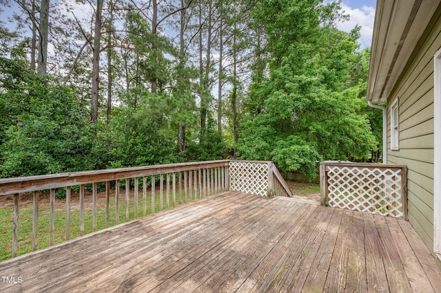 816 Kimpton Ct, Fuquay Varina, NC 27526 - wooden deck with view of wooded area