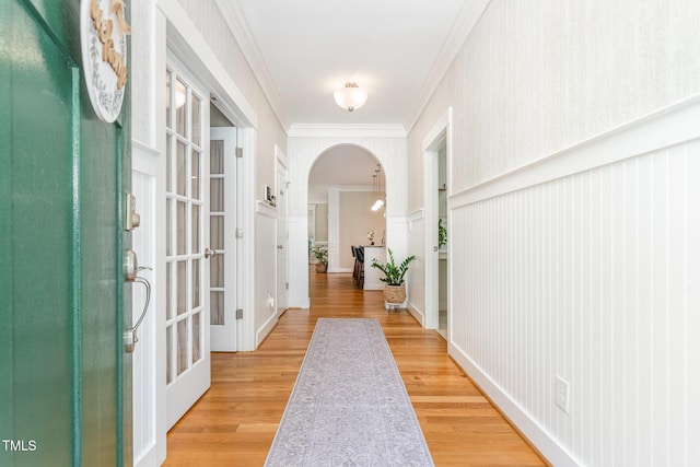 6 Tulip Tree Ct, Durham, NC 27712 - entrance foyer featuring arched walkways, crown molding, and light wood finished floors