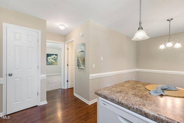 86 Basswood Cir, Willow Springs, NC 27592 - kitchen with dark wood-type flooring, hanging light fixtures, a chandelier, white dishwasher, and light countertops