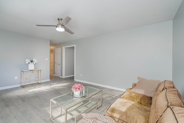 5917 Meadowlark Ln, Raleigh, NC 27610 - living room featuring ceiling fan and wood finished floors