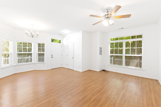 11710 Mezzanine Dr Unit 101, Raleigh, NC 27614 - unfurnished room with a chandelier, ornamental molding, light wood-style flooring, ceiling fan, and electric panel