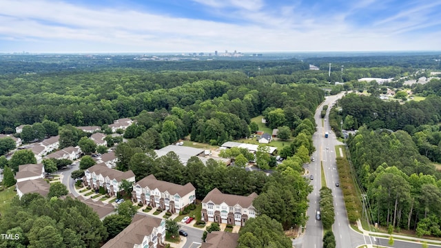 5503 Silver Moon Ln, Raleigh, NC 27606 - aerial perspective of suburban area featuring a heavily wooded area