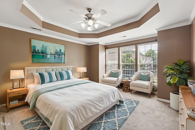 5503 Silver Moon Ln, Raleigh, NC 27606 - bedroom featuring a raised ceiling, crown molding, light colored carpet, and a ceiling fan