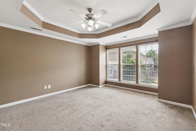 5503 Silver Moon Ln, Raleigh, NC 27606 - carpeted spare room featuring a raised ceiling, crown molding, and ceiling fan