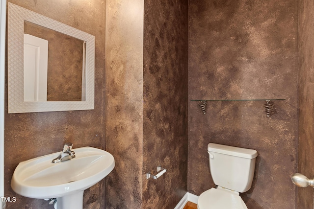 5503 Silver Moon Ln, Raleigh, NC 27606 - half bath featuring a sink and toilet