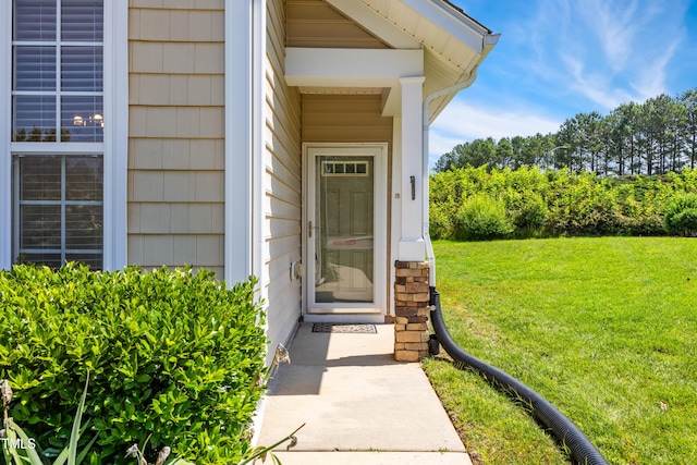 15 Canary Ct, Durham, NC 27713 - doorway to property with a lawn
