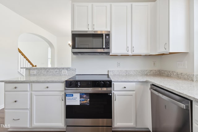 15 Canary Ct, Durham, NC 27713 - kitchen featuring stainless steel appliances and white cabinets