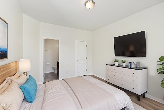 15 Canary Ct, Durham, NC 27713 - bedroom featuring ensuite bathroom and wood finished floors