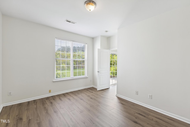 15 Canary Ct, Durham, NC 27713 - unfurnished room with wood finished floors and baseboards
