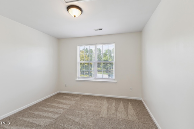 15 Canary Ct, Durham, NC 27713 - carpeted spare room featuring baseboards