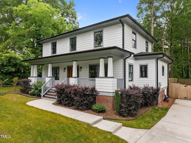 2551 Drake Ave, Durham, NC 27705 - american foursquare style home featuring a porch