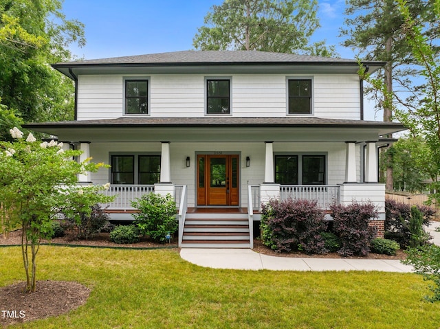 2551 Drake Ave, Durham, NC 27705 - view of front of property featuring a porch, roof with shingles, and a front lawn