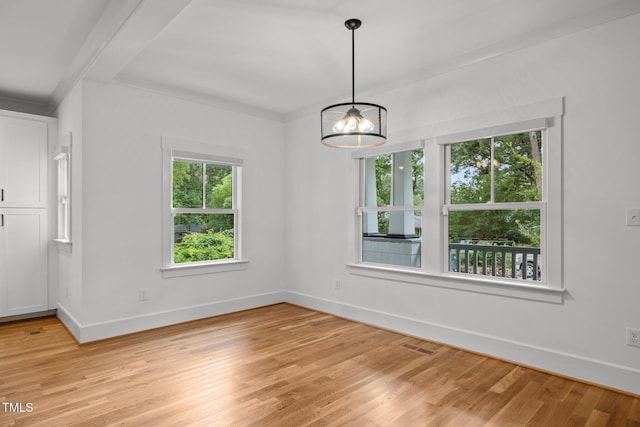 2551 Drake Ave, Durham, NC 27705 - spare room with light wood finished floors and a chandelier
