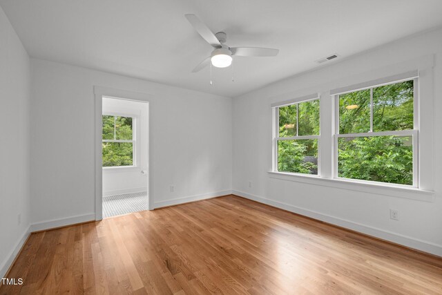 2551 Drake Ave, Durham, NC 27705 - empty room with ceiling fan and light wood-style flooring
