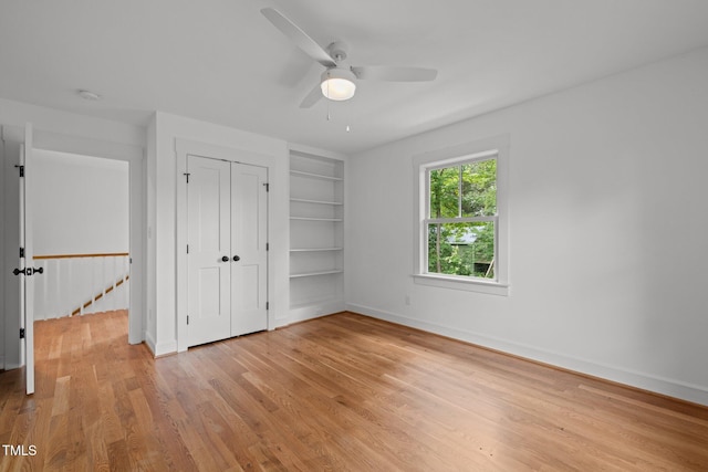 2551 Drake Ave, Durham, NC 27705 - unfurnished bedroom featuring light wood-type flooring, a closet, and ceiling fan