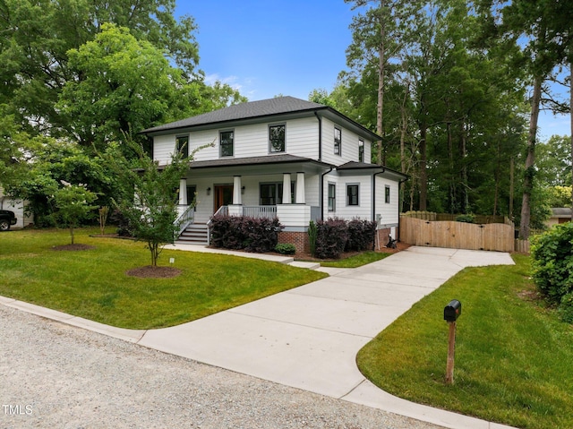 2551 Drake Ave, Durham, NC 27705 - view of front of property with a porch, concrete driveway, and a gate