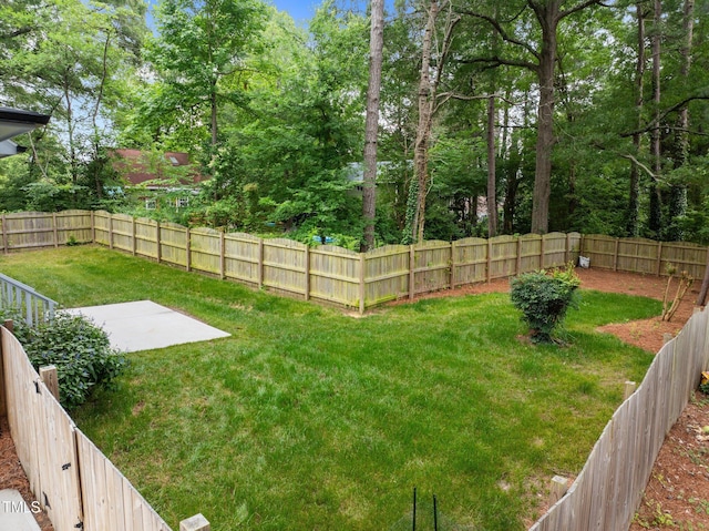 2551 Drake Ave, Durham, NC 27705 - fenced backyard with a patio area
