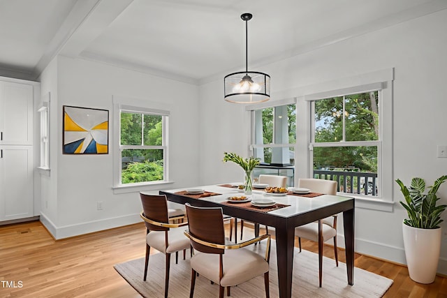 2551 Drake Ave, Durham, NC 27705 - dining area featuring light wood finished floors and a chandelier