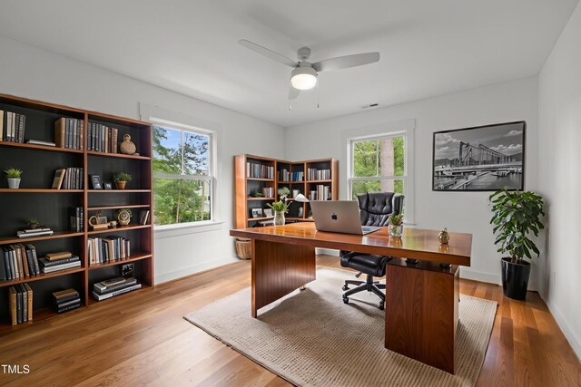 2551 Drake Ave, Durham, NC 27705 - home office with ceiling fan and wood finished floors