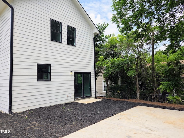 608A E Umstead, Durham, NC 27701 - rear view of house featuring a patio area
