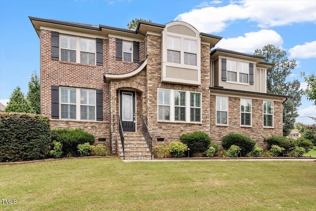 150 Saint Mellion St, Raleigh, NC 27603 - view of front of property with stone siding and a front lawn