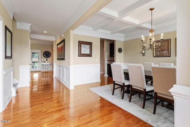 150 Saint Mellion St, Raleigh, NC 27603 - dining area with a chandelier, beam ceiling, light wood finished floors, ornamental molding, and recessed lighting