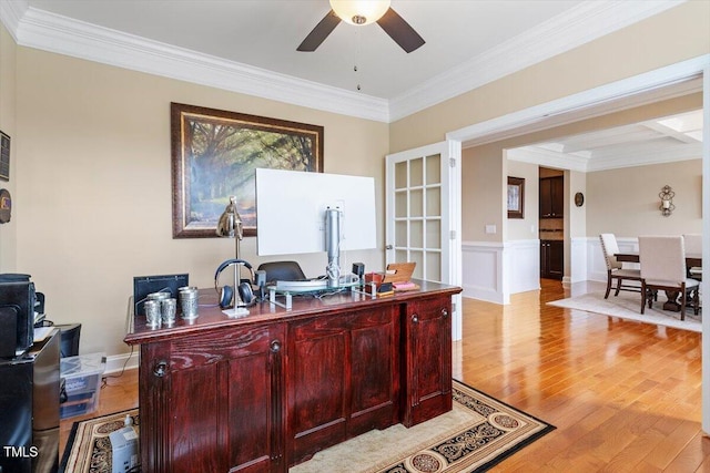 150 Saint Mellion St, Raleigh, NC 27603 - office with light wood-type flooring, ceiling fan, ornamental molding, and a wainscoted wall