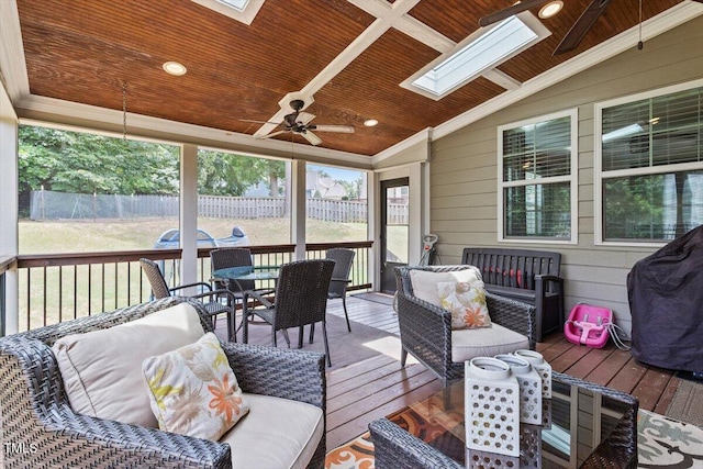 150 Saint Mellion St, Raleigh, NC 27603 - sunroom / solarium with a skylight, outdoor dining area, a ceiling fan, and lofted ceiling