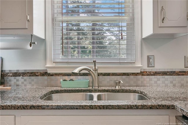 140 Bledsoe St, Hope Mills, NC 28348 - kitchen view of a sink and tasteful backsplash