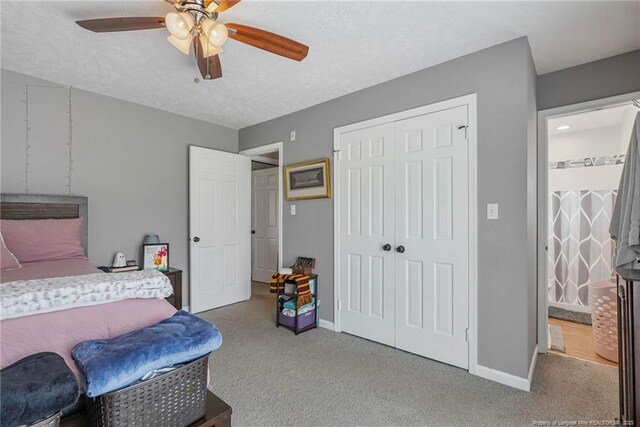 140 Bledsoe St, Hope Mills, NC 28348 - carpeted bedroom featuring a closet, a textured ceiling, and ceiling fan