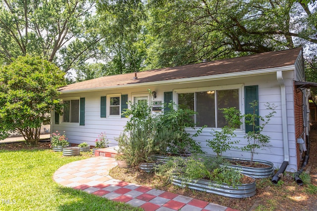 2009 Carolina Ave, Durham, NC 27705 - ranch-style home featuring a front lawn
