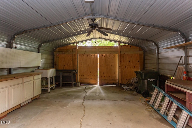 2009 Carolina Ave, Durham, NC 27705 - garage with metal wall and ceiling fan
