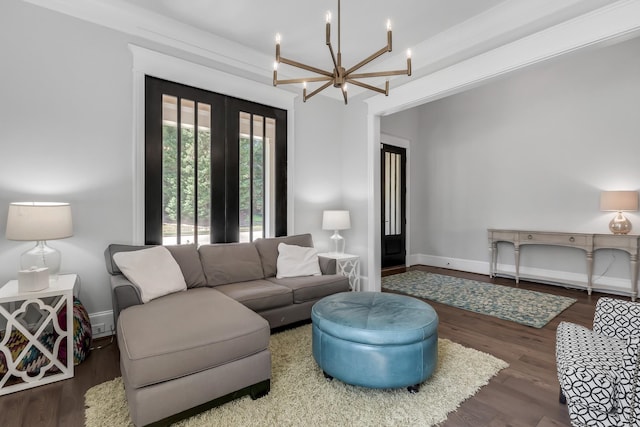 6900 Staghorn Ln, Raleigh, NC 27615 - living area featuring a chandelier and wood finished floors